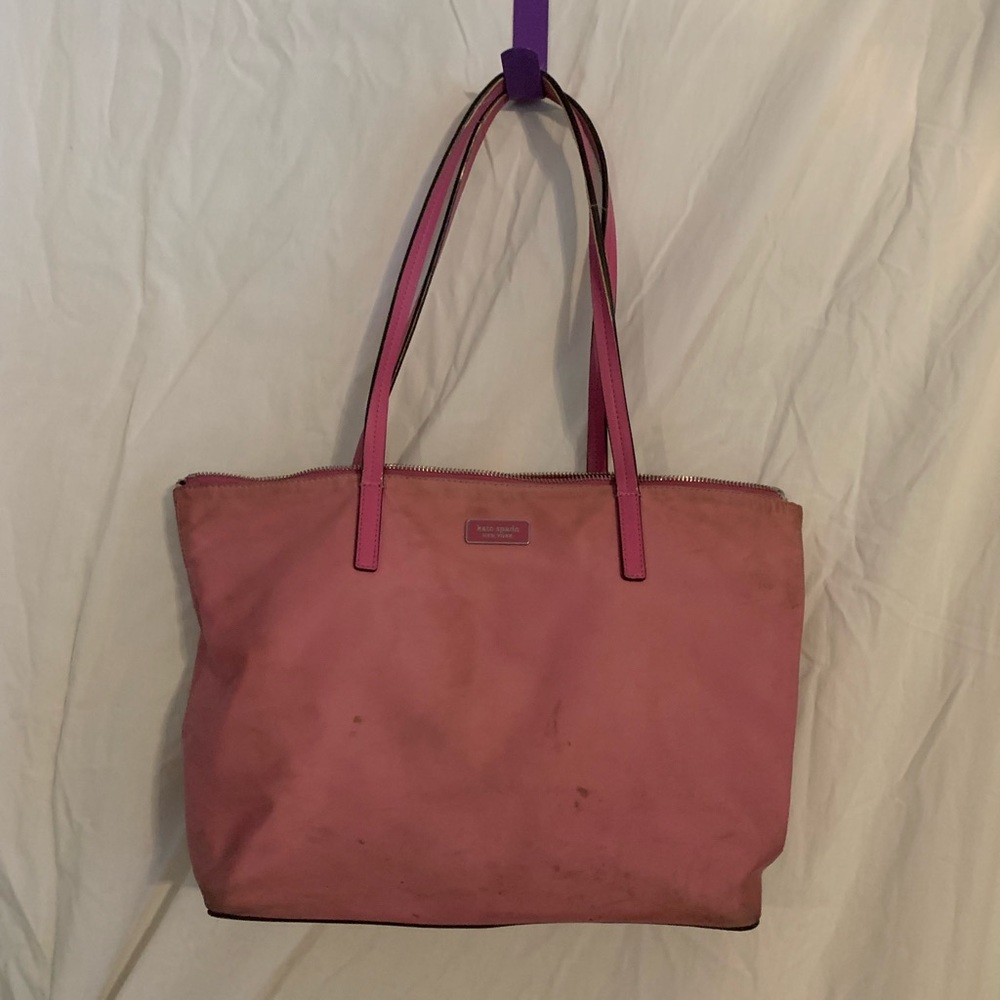 Pink Kate Spade bag.  Well loved and could use a little more.